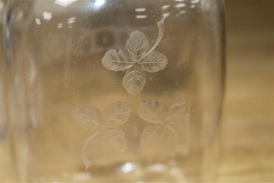 Four 18th/19th century etched glass flasks, one with silver mounted stopper tallest 19.5cm